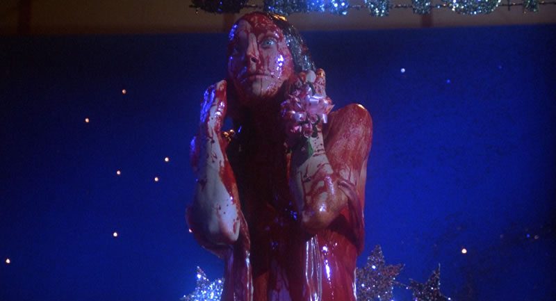 The dirtiest high school prank in history. Carrie gets drenched in blood.