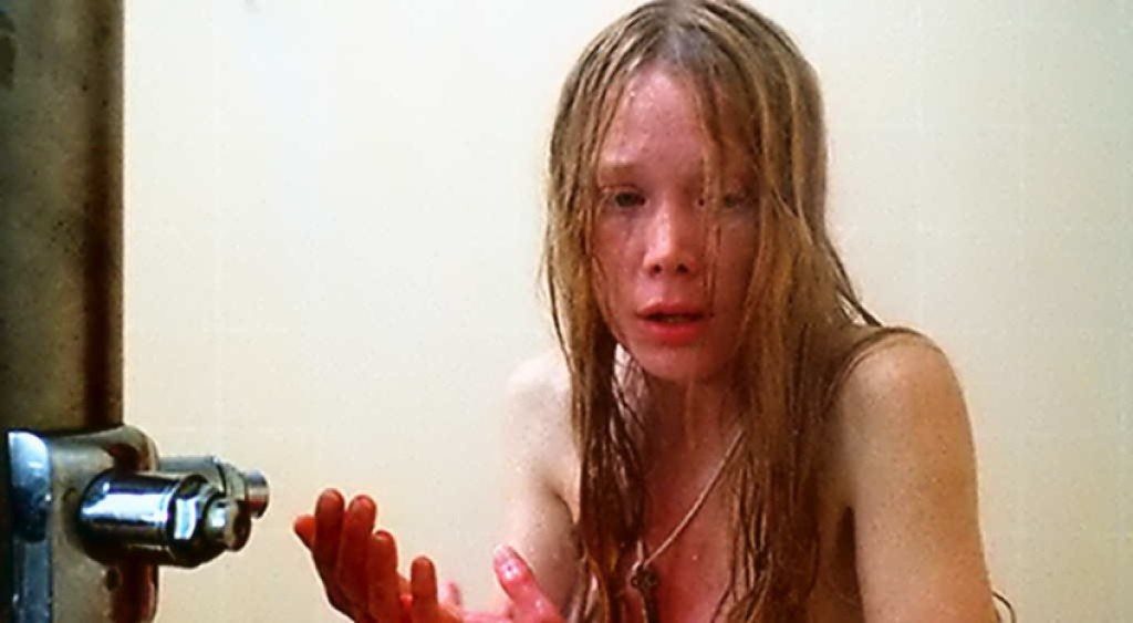 Carrie suddenly realizes something is terribly wrong while showering in the locker room.