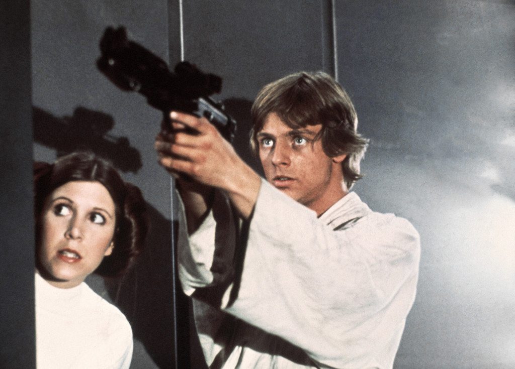 In this image provided by 20th Century-Fox Film Corporation, a scene from "Star Wars" movie released by 20th Century-Fox in 1977.  From left are: Carrie Fisher and Mark Hamill. (AP Photo/20th Century-Fox Film Corporation)