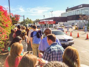 Audience members wait outside CBS Television City for their call into the studio.