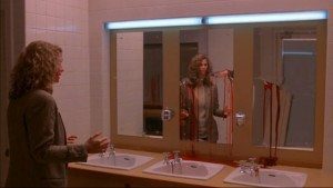 Dr. Farmer learns why women always go into the bathroom in pairs--so someone can run and get help when the mirrors start bleeding.