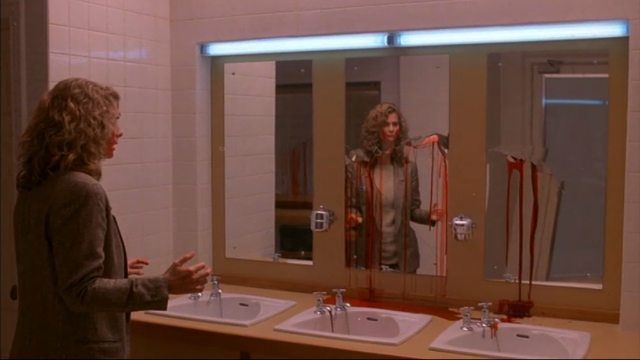 Dr. Farmer learns why women always go into the bathroom in pairs--so someone can run and get help when the mirrors start bleeding. 