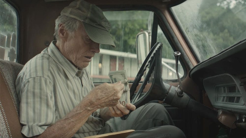 Earl returns to his truck to find more money than he can count waiting in his glovebox.
